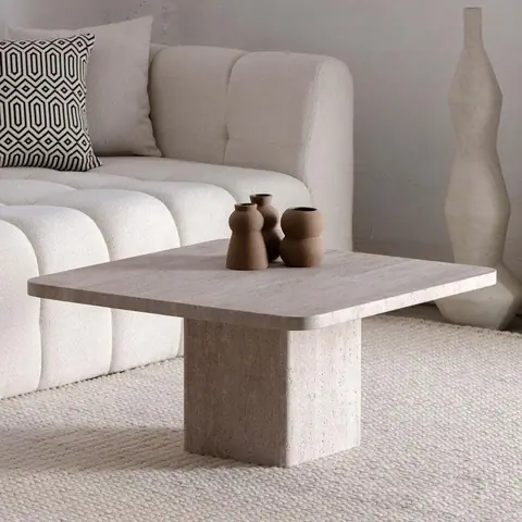 Table basse japandi carrée Muji en travertin à pied central